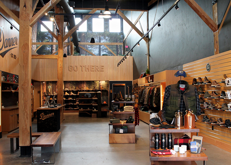 Wide view of the entire sales floor - wood and exposed beams are a key design feature